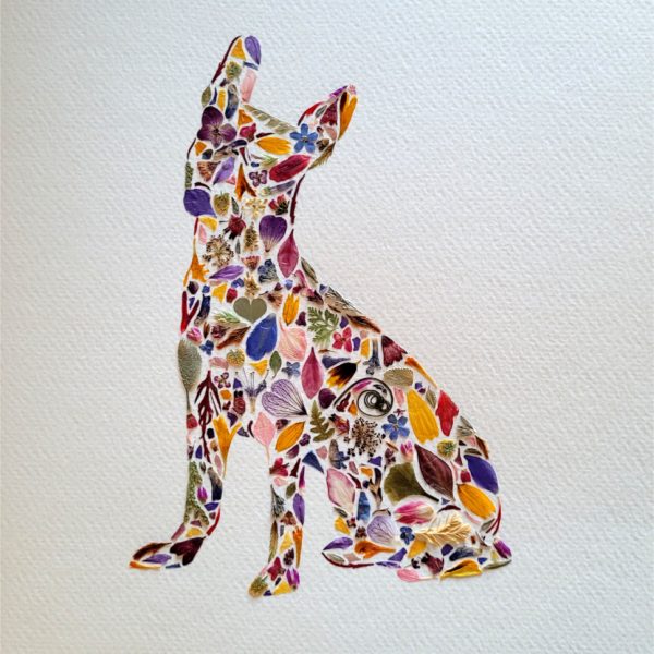 artwork of a dog made of pressed flowers